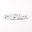 BRACELET ANTI-STRESS HOWLITE ET PERLE ACIER INOXYDABLE  / ZIMBABWE 8mm