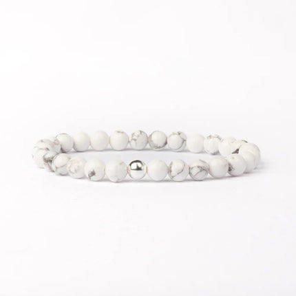 BRACELET ANTI-STRESS HOWLITE ET PERLE ACIER INOXYDABLE  / ZIMBABWE 8mm